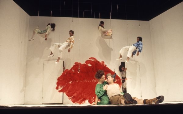 Sally Jacobs’ white ‘box’, with Titania and Bottom in the foreground, and Demetrius and other characters hanging from trapezes. Reg Wilson © RSC
