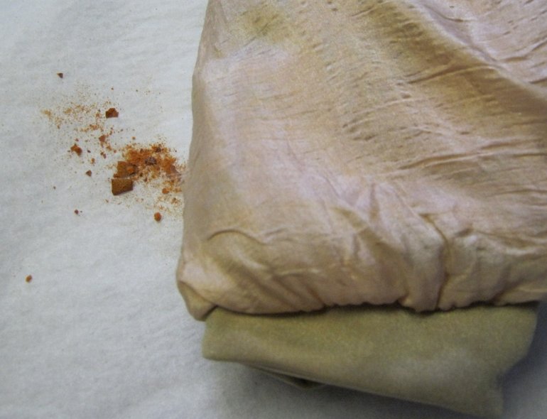 Degrading foam seeping out from silk fabric containing ‘hump’