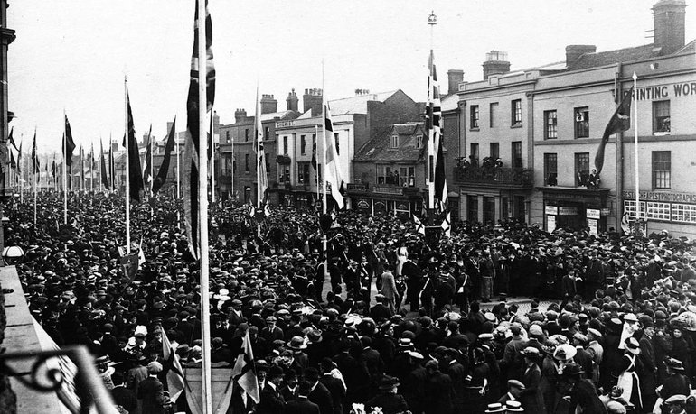 Crowds gathered to witness the unfurling of the flags in Bridge Street.