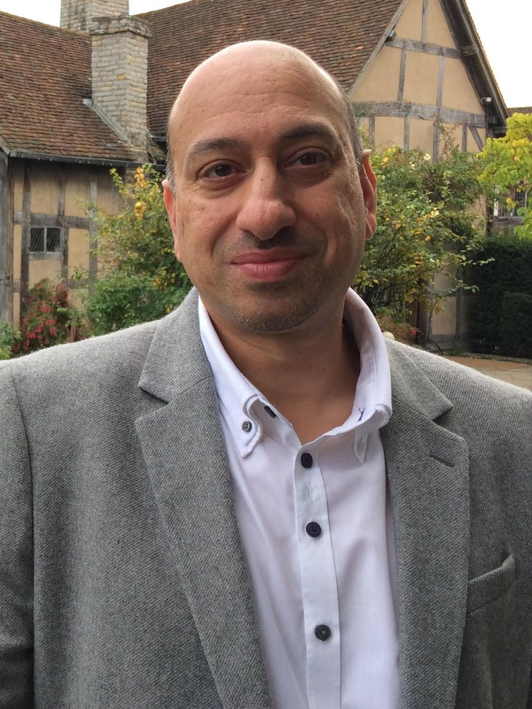 Photo of Ayub Khan in front of Shakespeare's Birthplace.