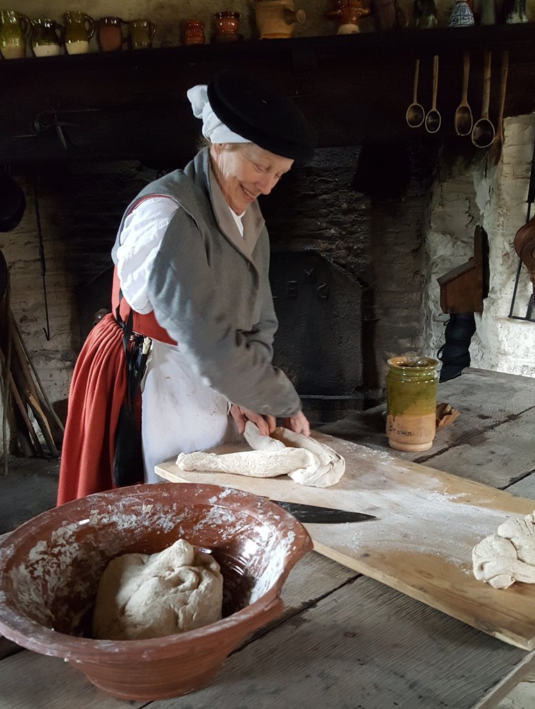 Mistress Sarah making bread dough