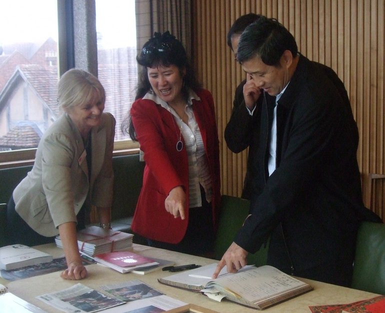 Diana Owen showing Sun Zhijun Chinese items from the collections
