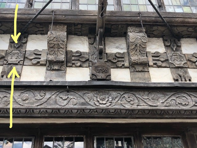 T.R. (Thomas Rogers) carved into facade of Harvard House
