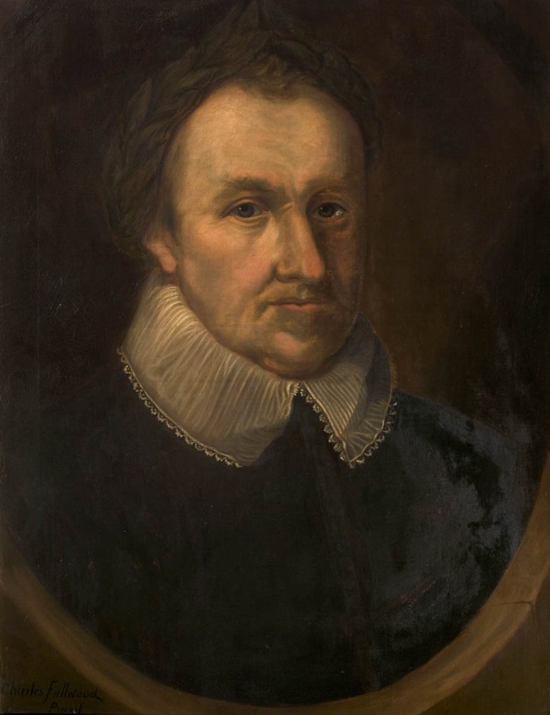 A portrait of Michael Drayton : dark hair, cut with a peak over a high forehead, a serious face with a strong, straight nose, a firm mouth with compressed lips, and a slight shadow of beard, He wears a dark top with a deep lace collar.