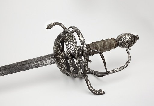 A steel Spanish rapier dating back to around 1600. The cupped guard has been encrusted in silver in a Moorish decorative scheme.