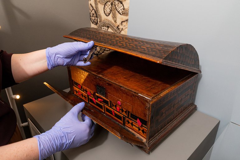 Emily White performing checks on the Medicine Chest on display.