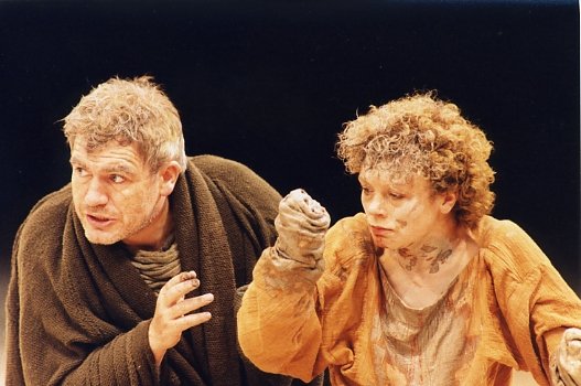 Titus Andronicus. Titus and Lavinia, played by Sonia Ritter, following her rape and mutilation. She holds up one handless fist, while Titus looks suspiciously ahead.